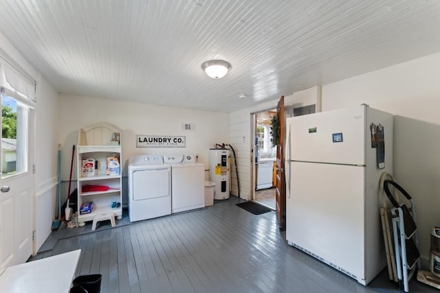 3102 Crescent Cir, Chattanooga, TN 37407 - kitchen featuring freestanding refrigerator, water heater, and dark wood-type flooring