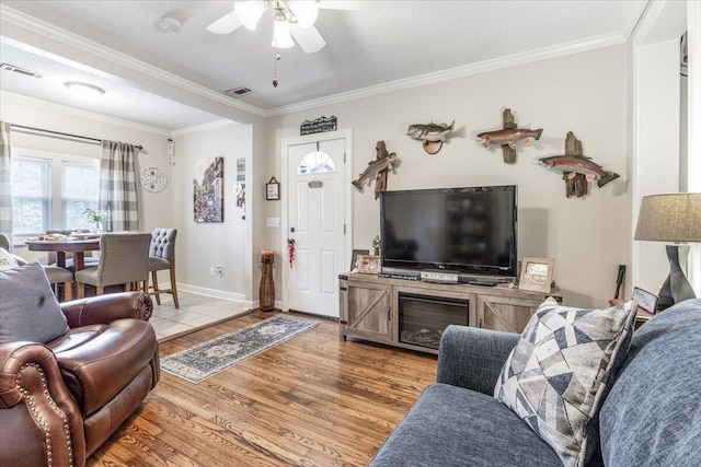 615 S Moore Rd, Chattanooga, TN 37412 - living area with ceiling fan, crown molding, and light wood-type flooring