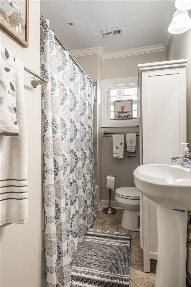 615 S Moore Rd, Chattanooga, TN 37412 - full bath with crown molding, tile patterned floors, and curtained shower
