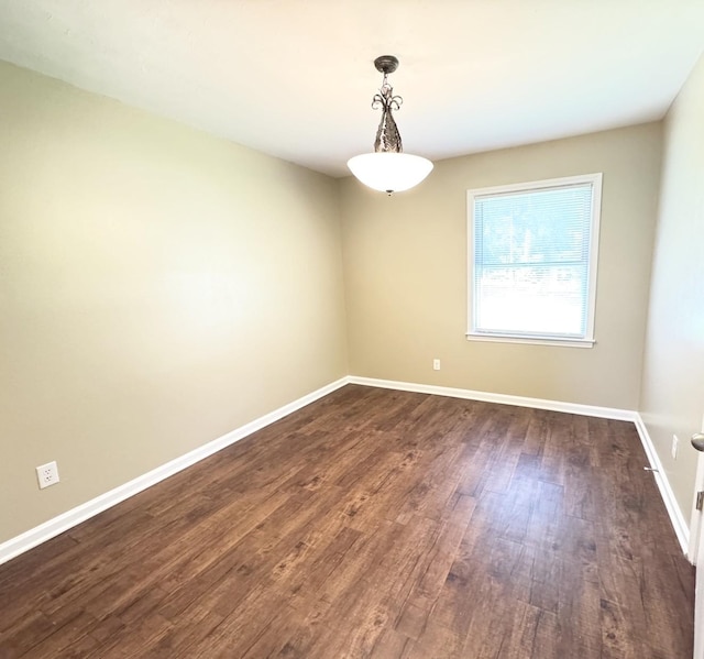 3084 Edgeware Rd S, Memphis, TN 38118 - unfurnished room featuring dark wood finished floors and baseboards