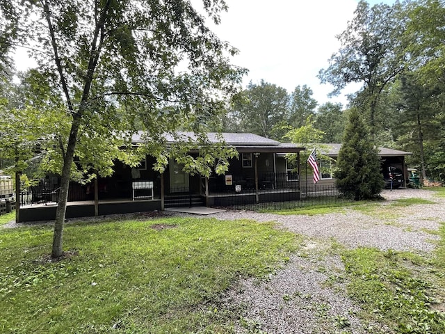 407 Cedar Rd, Pikeville, TN 37367 - back of property featuring a porch and a yard