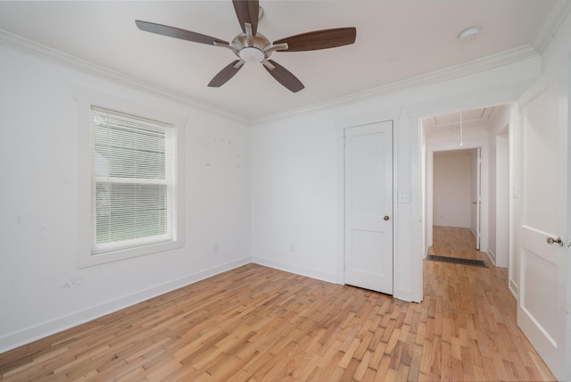 400 7th Ave, Fayetteville, TN 37334 - empty room featuring attic access, a smoke detector, light wood-style floors, crown molding, and a ceiling fan