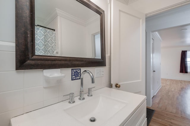 400 7th Ave, Fayetteville, TN 37334 - bathroom with ornamental molding, tasteful backsplash, wood finished floors, and vanity
