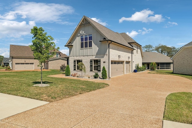1111 Willow Springs Dr, Lebanon, TN 37087 - view of front facade with board and batten siding, driveway, a front lawn, brick siding, and a garage