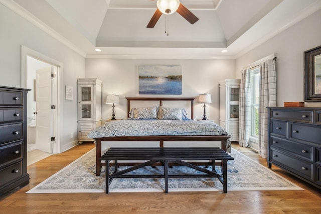 1111 Willow Springs Dr, Lebanon, TN 37087 - bedroom with vaulted ceiling, a raised ceiling, light wood-style floors, ornamental molding, and recessed lighting