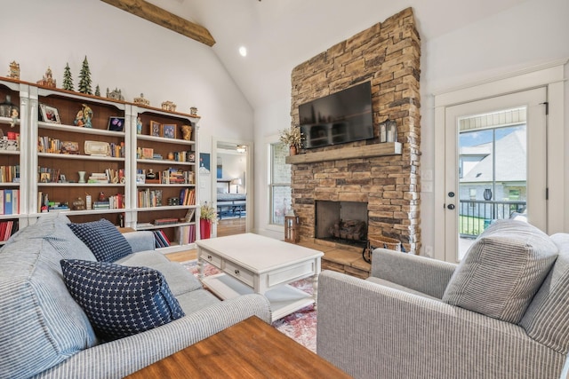 1111 Willow Springs Dr, Lebanon, TN 37087 - living room with high vaulted ceiling, a stone fireplace, and beam ceiling