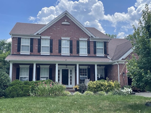 9733 Valley Springs Dr, Brentwood, TN 37027 - view of front of property featuring covered porch, brick siding, and a shingled roof