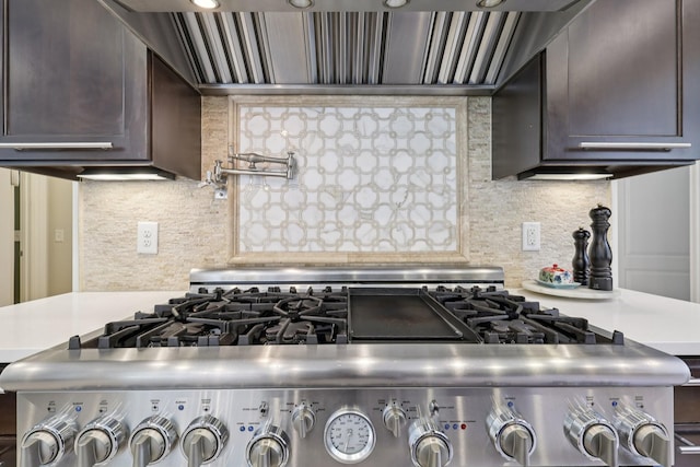 3 Annandale, Nashville, TN 37215 - kitchen featuring range, dark brown cabinetry, light countertops, tasteful backsplash, and recessed lighting