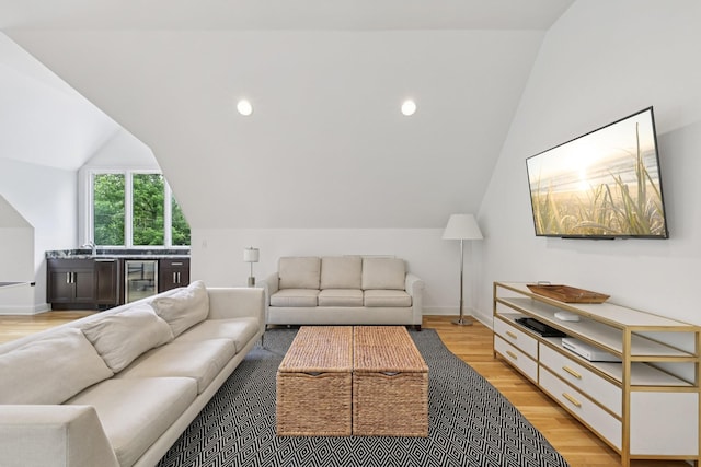 3 Annandale, Nashville, TN 37215 - living room featuring beverage cooler, vaulted ceiling, and light wood finished floors