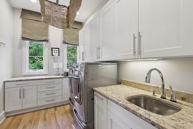 3 Annandale, Nashville, TN 37215 - washroom featuring cabinet space, washing machine and dryer, and light wood-style flooring