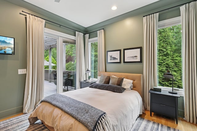 3 Annandale, Nashville, TN 37215 - bedroom featuring access to outside, multiple windows, and wood finished floors
