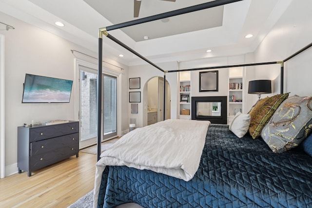 3 Annandale, Nashville, TN 37215 - bedroom with light wood-type flooring, a raised ceiling, and recessed lighting