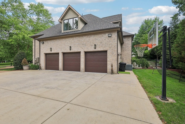 3 Annandale, Nashville, TN 37215 - view of side of home featuring driveway, brick siding, a lawn, and roof with shingles