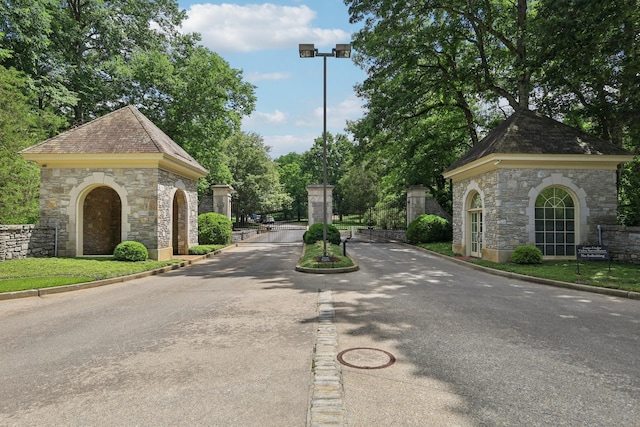3 Annandale, Nashville, TN 37215 - view of asphalt road featuring curbs, street lights, a gate, and a gated entry