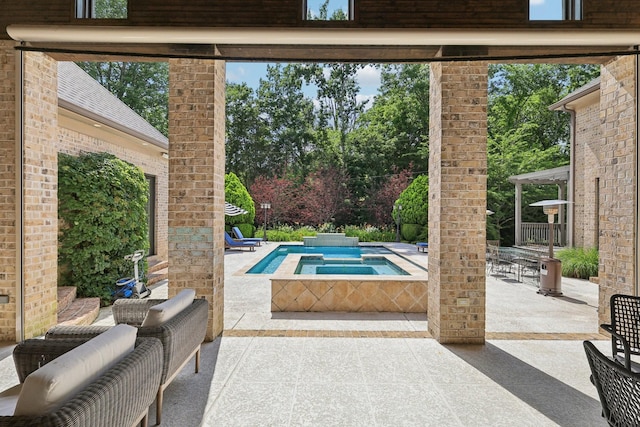 3 Annandale, Nashville, TN 37215 - view of swimming pool with an in-ground hot tub, a patio area, and view of scattered trees