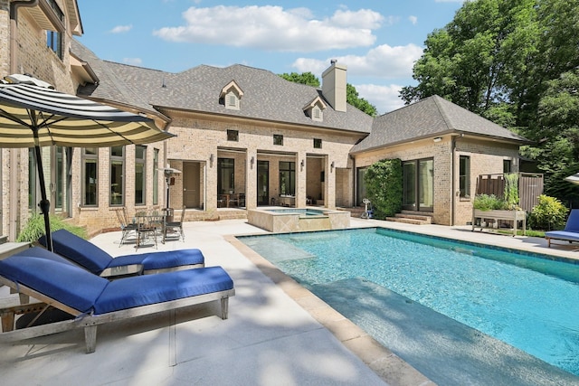 3 Annandale, Nashville, TN 37215 - view of pool with a patio area, a pool with connected hot tub, and an outbuilding