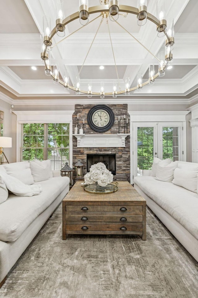1808 Mosaic Trl, Murfreesboro, TN 37130 - living room with coffered ceiling, a stone fireplace, ornamental molding, a chandelier, and beam ceiling