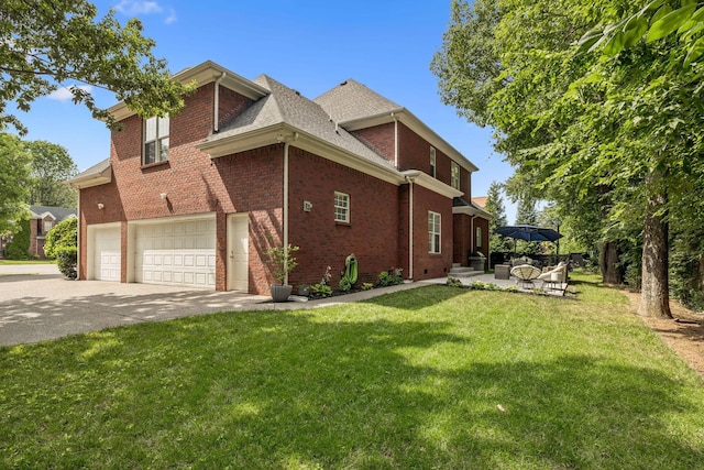 1808 Mosaic Trl, Murfreesboro, TN 37130 - view of side of home featuring driveway, a yard, a garage, and brick siding