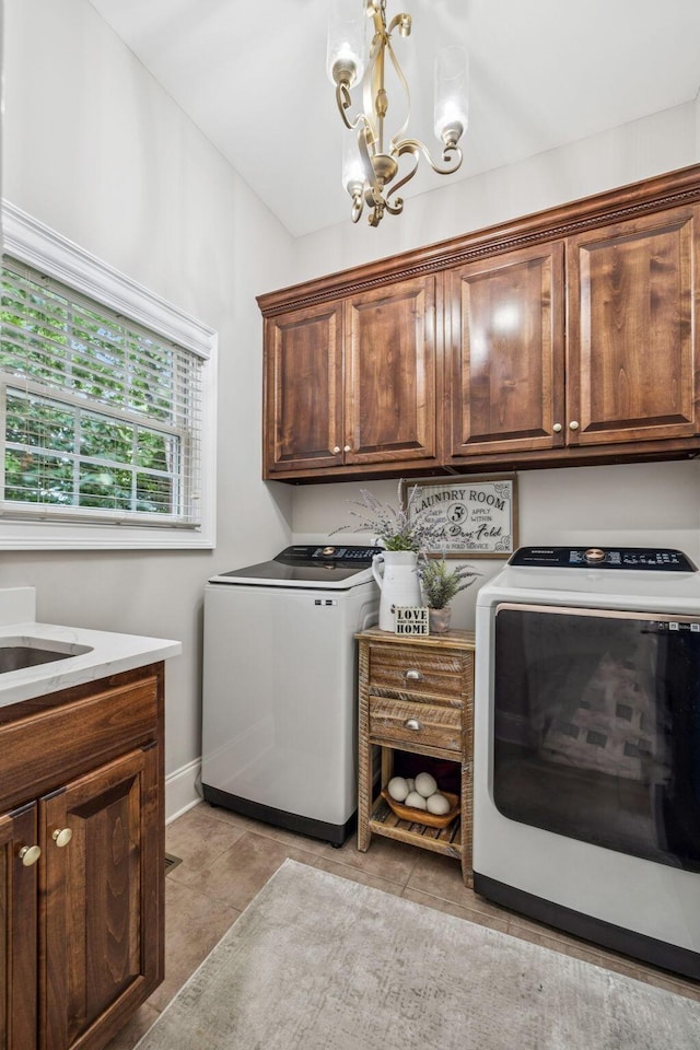 1808 Mosaic Trl, Murfreesboro, TN 37130 - laundry area featuring cabinet space, washer and clothes dryer, and a chandelier
