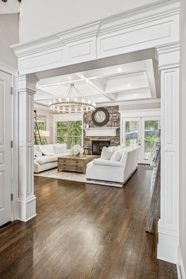 1808 Mosaic Trl, Murfreesboro, TN 37130 - living area with a chandelier, dark wood-type flooring, plenty of natural light, ornate columns, and crown molding