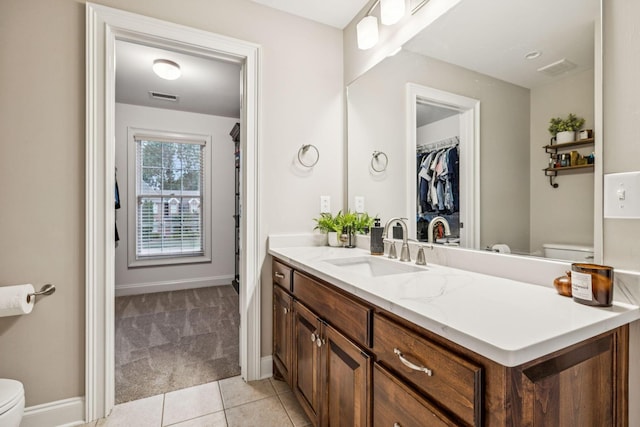 1808 Mosaic Trl, Murfreesboro, TN 37130 - bathroom with vanity, tile patterned flooring, and a spacious closet