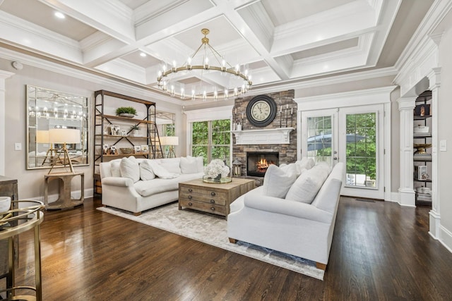 1808 Mosaic Trl, Murfreesboro, TN 37130 - living area featuring a fireplace, wood finished floors, decorative columns, ornamental molding, and a chandelier