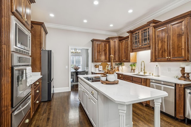 1808 Mosaic Trl, Murfreesboro, TN 37130 - kitchen with stainless steel appliances, a warming drawer, light countertops, a kitchen island, and dark wood-type flooring