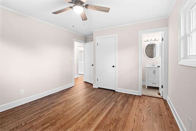 101 Arnold Ln, Murfreesboro, TN 37127 - unfurnished bedroom featuring wood finished floors, ornamental molding, ensuite bath, and a ceiling fan