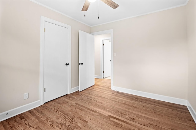 101 Arnold Ln, Murfreesboro, TN 37127 - unfurnished bedroom with wood finished floors, crown molding, and a ceiling fan
