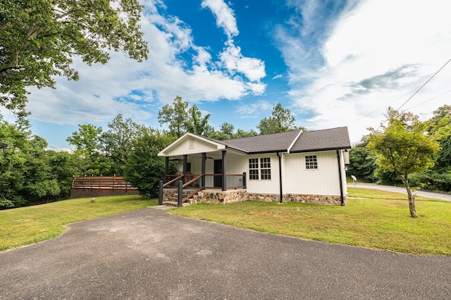 841 Marble Top Rd, Chickamauga, GA 30707 - view of front of house with covered porch, a front lawn, and a shingled roof