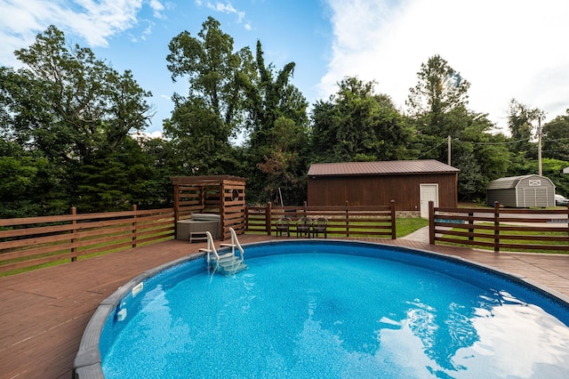 841 Marble Top Rd, Chickamauga, GA 30707 - view of pool featuring a deck, a storage unit, and view of wooded area