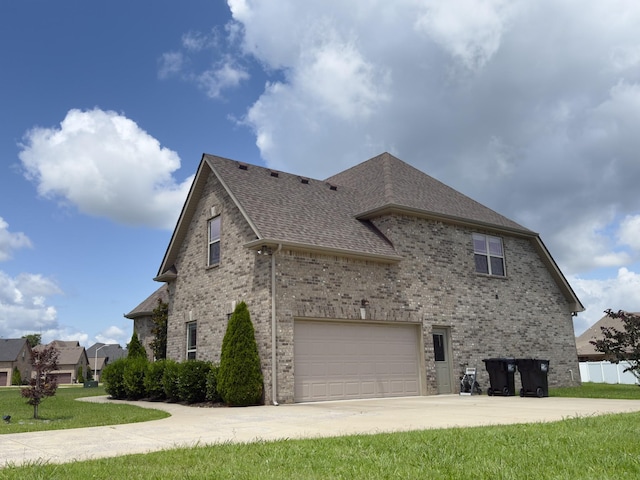5120 Prickly Pine Pl, Murfreesboro, TN 37129 - view of side of property with driveway, brick siding, and roof with shingles