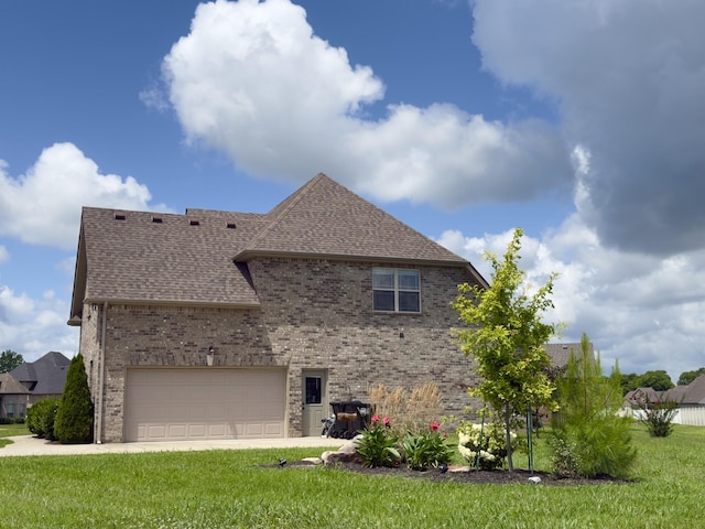 5120 Prickly Pine Pl, Murfreesboro, TN 37129 - view of home's exterior featuring a shingled roof, brick siding, a yard, driveway, and an attached garage