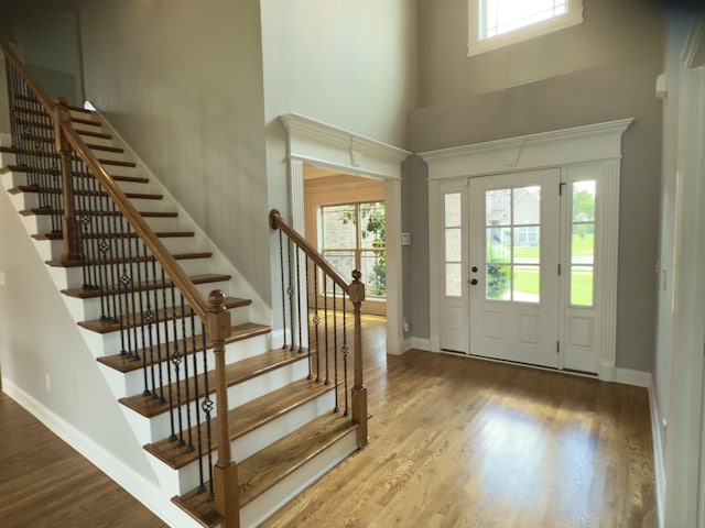 5120 Prickly Pine Pl, Murfreesboro, TN 37129 - foyer entrance with a high ceiling, stairway, and wood finished floors