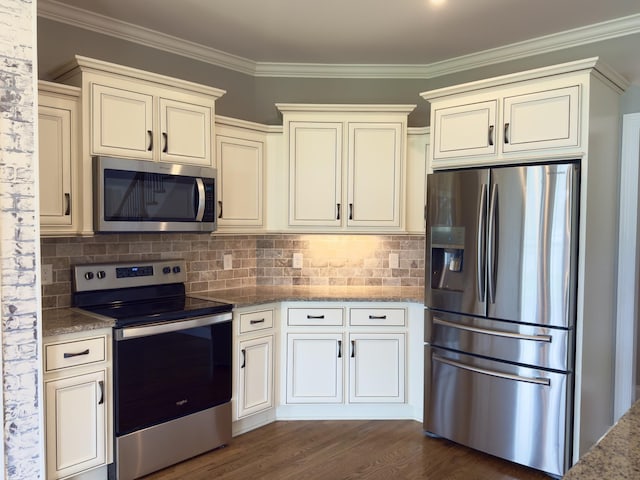 5120 Prickly Pine Pl, Murfreesboro, TN 37129 - kitchen with appliances with stainless steel finishes, stone countertops, dark wood finished floors, tasteful backsplash, and ornamental molding