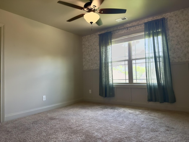 5120 Prickly Pine Pl, Murfreesboro, TN 37129 - carpeted spare room featuring wallpapered walls, a wainscoted wall, and a ceiling fan