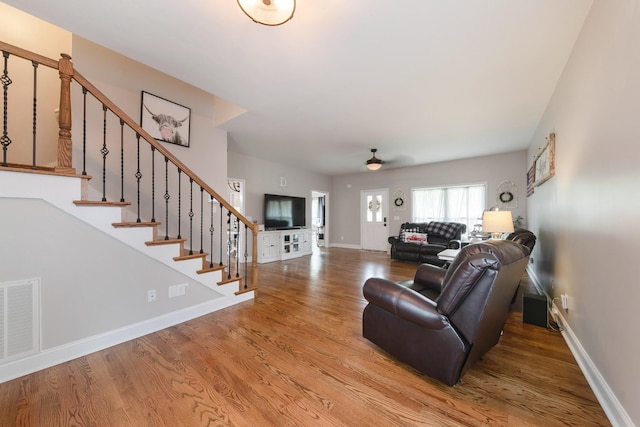 114 Deerview Dr, Columbia, TN 38401 - living room with wood finished floors, stairway, and a ceiling fan