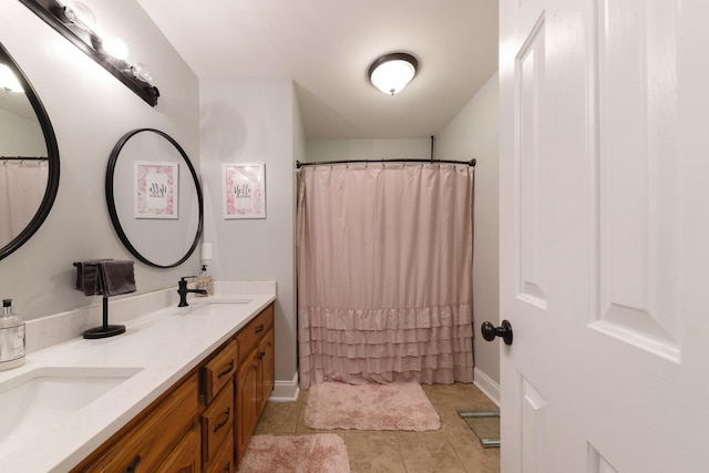 114 Deerview Dr, Columbia, TN 38401 - full bath featuring double vanity, tile patterned floors, and a shower with shower curtain