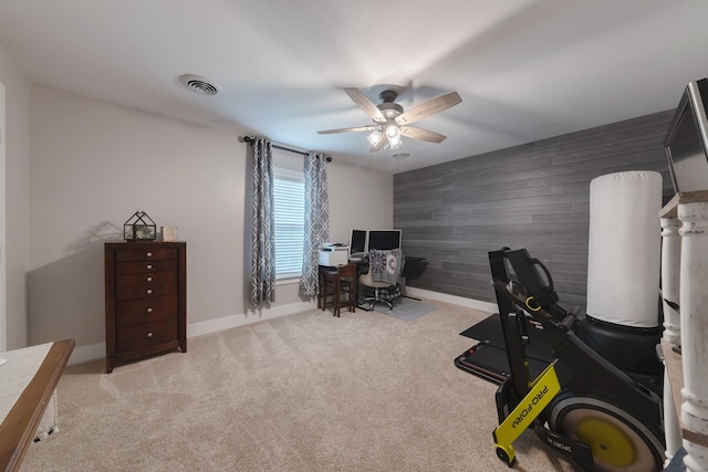 114 Deerview Dr, Columbia, TN 38401 - carpeted office with ceiling fan, wood walls, and an accent wall