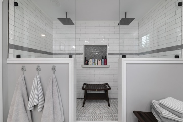 114 Deerview Dr, Columbia, TN 38401 - bathroom featuring walk in shower, tile walls, and tile patterned flooring
