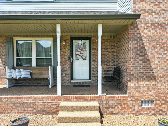 114 Deerview Dr, Columbia, TN 38401 - doorway to property with a porch and brick siding
