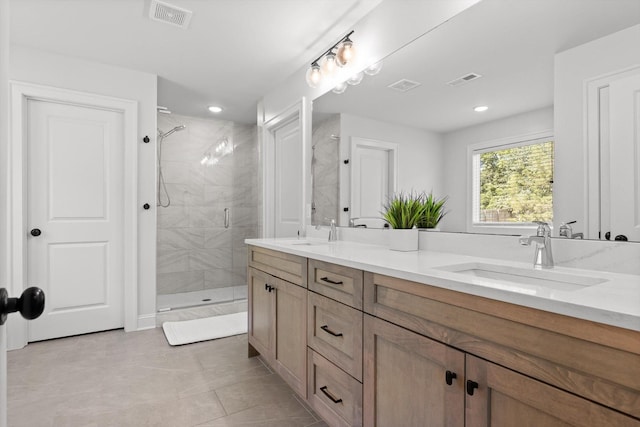 8665 Woodbury Acre Ct, Harrison, TN 37341 - full bath featuring double vanity, a shower stall, recessed lighting, and tile patterned floors