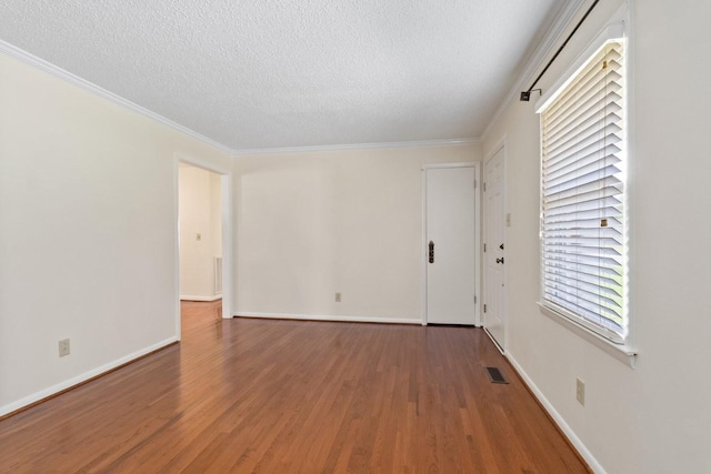 435 Forest St, Lewisburg, TN 37091 - empty room with a textured ceiling, wood finished floors, and crown molding