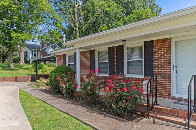 435 Forest St, Lewisburg, TN 37091 - view of front of house with brick siding and covered porch