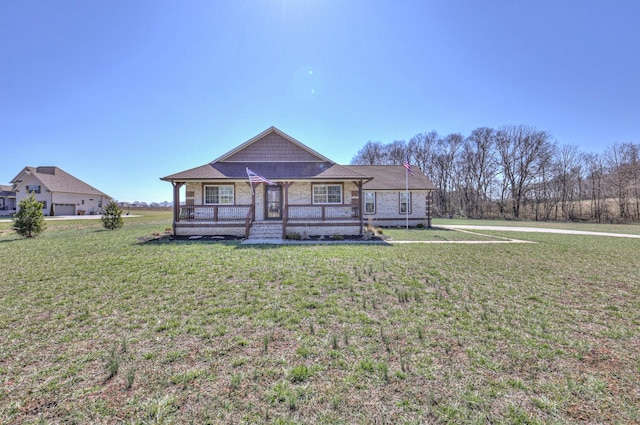 1059 S Cross Bridges Rd, Mount Pleasant, TN 38474 - view of front of home with a porch and a front lawn