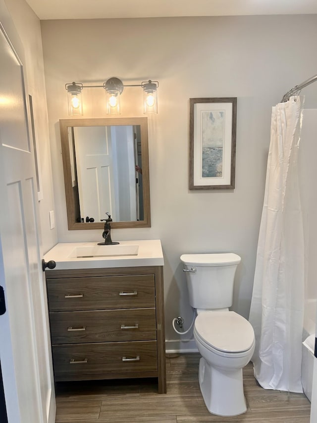1059 S Cross Bridges Rd, Mount Pleasant, TN 38474 - full bathroom with vanity, wood finished floors, and a shower with shower curtain