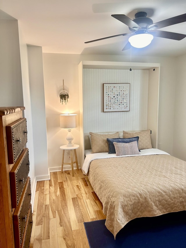 1059 S Cross Bridges Rd, Mount Pleasant, TN 38474 - bedroom with wood finished floors and a ceiling fan