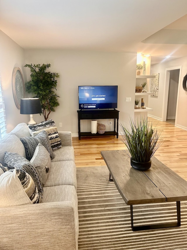 1059 S Cross Bridges Rd, Mount Pleasant, TN 38474 - living area featuring wood finished floors and baseboards