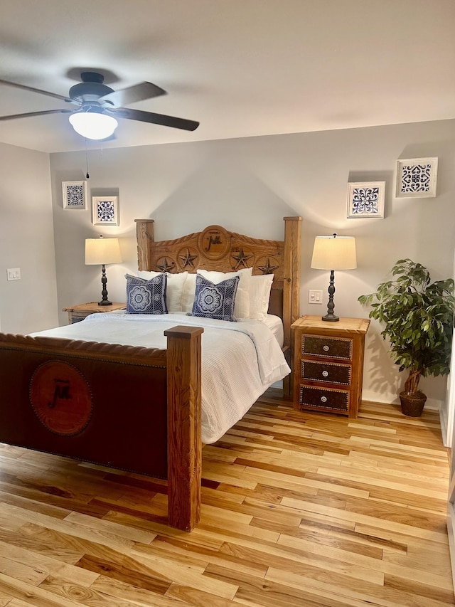 1059 S Cross Bridges Rd, Mount Pleasant, TN 38474 - bedroom featuring light wood-type flooring and a ceiling fan