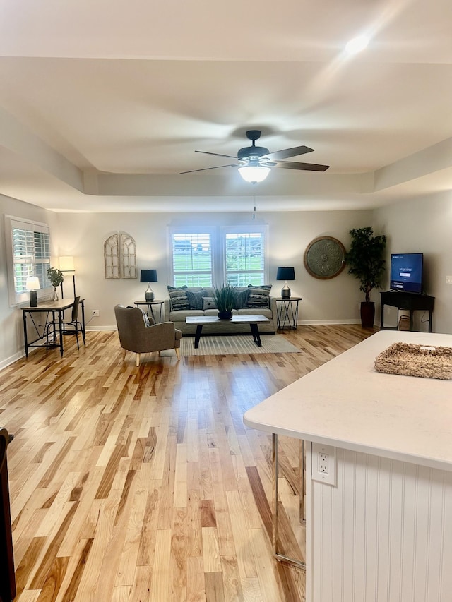 1059 S Cross Bridges Rd, Mount Pleasant, TN 38474 - living room with light wood finished floors and ceiling fan